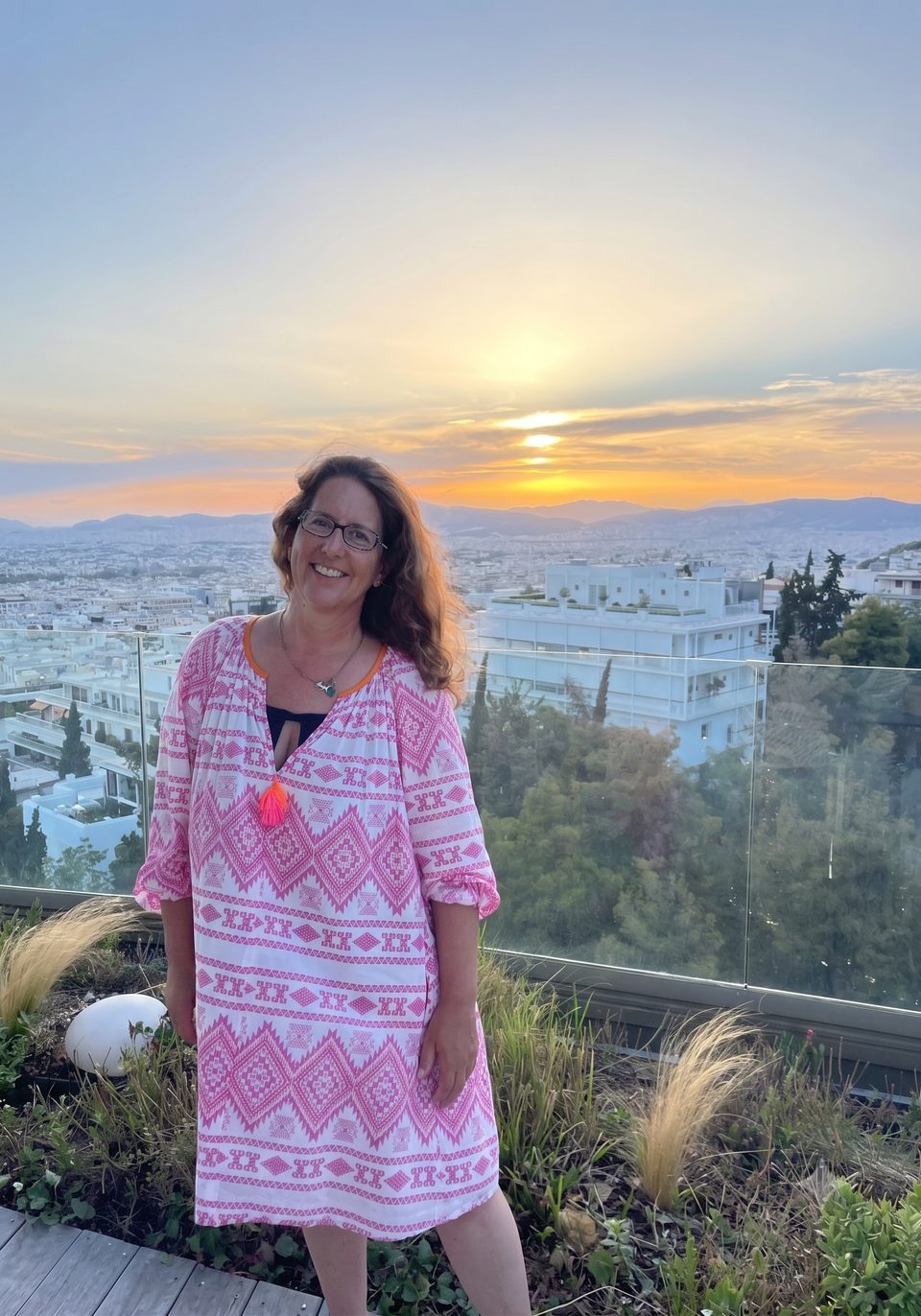Mary Jane Marcus on a rooftop in Athens at sunset